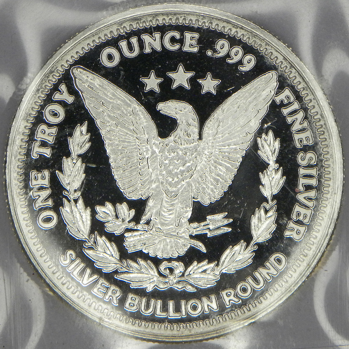 Silver Round with Morgan Dollar design (reverse)