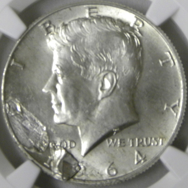 1964 Kennedy Half, with Obverse Lamination mint error.