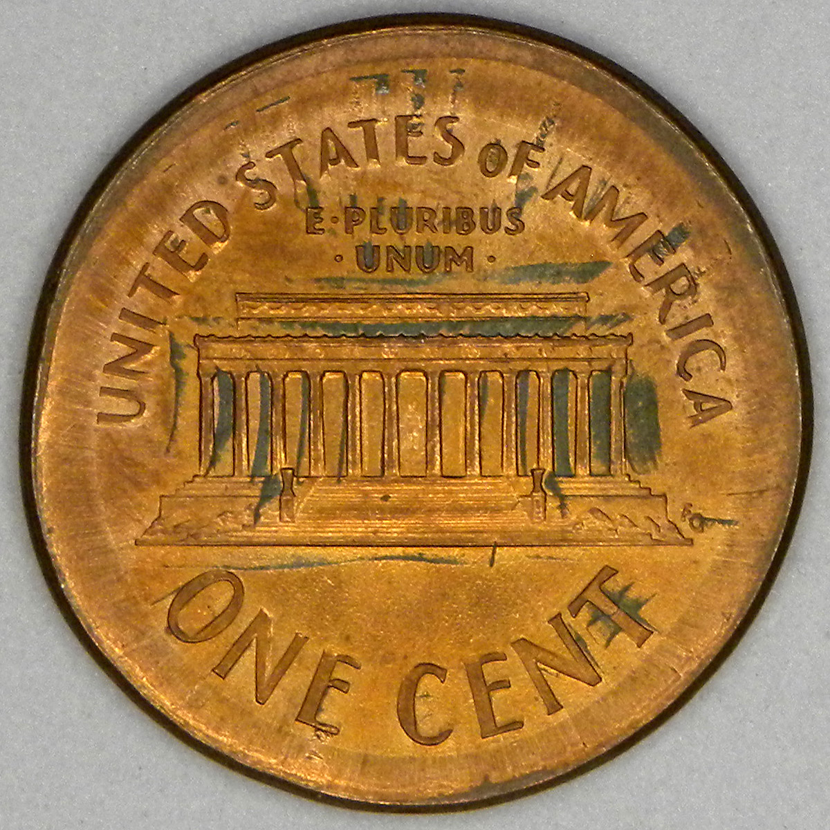 1999 "squeezed" (outside the mint?) cent (reverse).