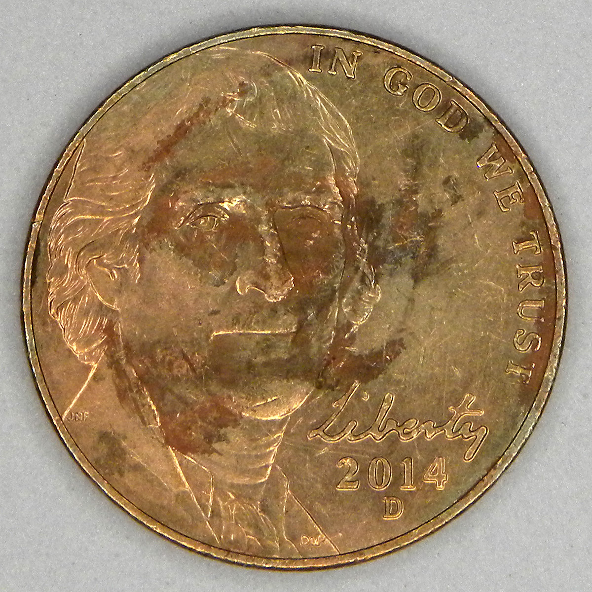 2014-D Jefferson nickel with discolored surface (obverse).