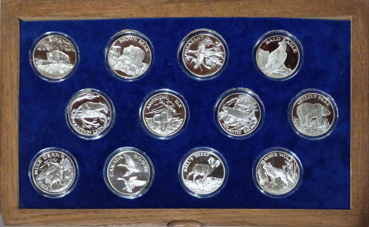 Set of 12 2-ounce silver rounds depicting North American wildlife.